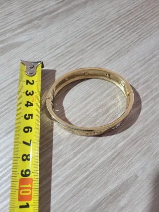 Pulsera rígida dorada cristales