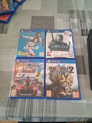 PS4 (PlayStation 4) con 12 juegos