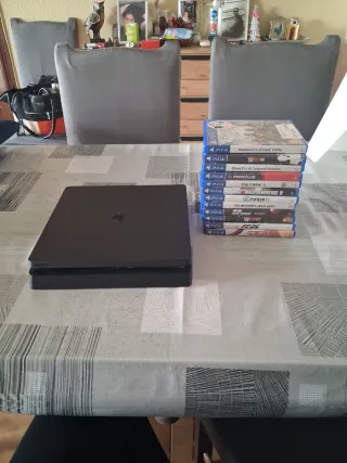 PS4 (PlayStation 4) con 12 juegos