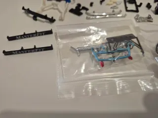 SCALEXTRIC LOTE PIEZAS UK Y OTROS-MIRAR