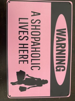 Cartel Advertencia: Vive una shopaholic