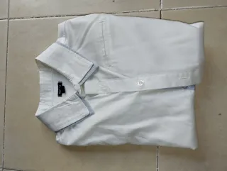 Confezione di 8 camicie per bambino. Taglia 8 anni Kiabi. M/L