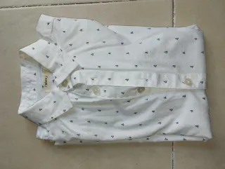 Confezione di 8 camicie per bambino. Taglia 8 anni Kiabi. M/L