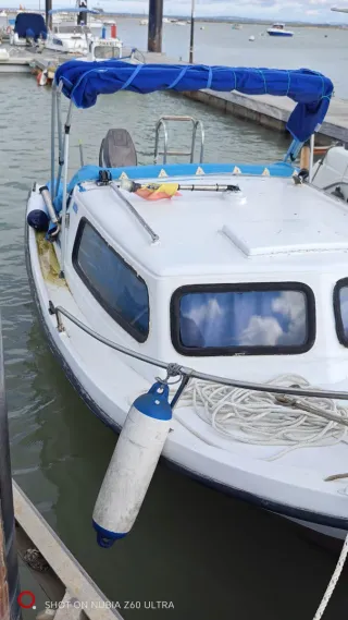 Barco Taylor con motor tohatsu 25 reson sonda