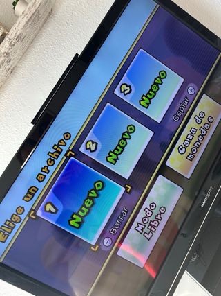 New Super Mario Bros. Wii + Grip Blanco