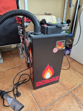 Chimenea de pellets gris. Aspirador chimenea.