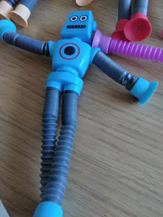 Muñecos Robot y Jirafa Extensibles