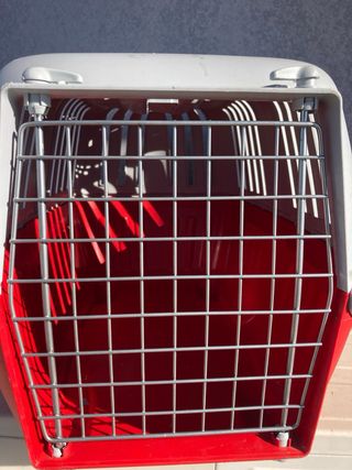 Transportín perro gris y rojo