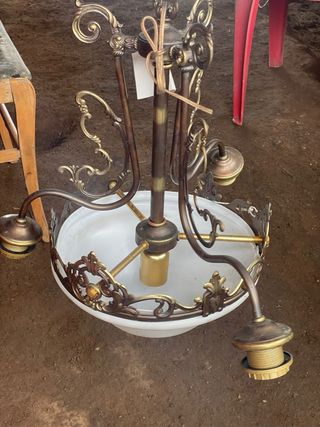 Candelabro dorado y transparente