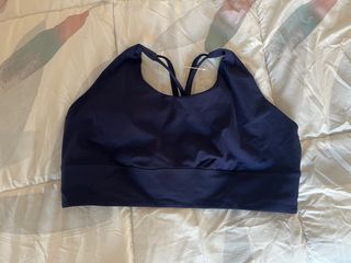 Top deportivo Oysho azul marino