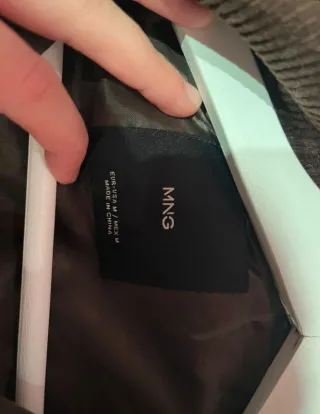 Chaqueta verde y marrón