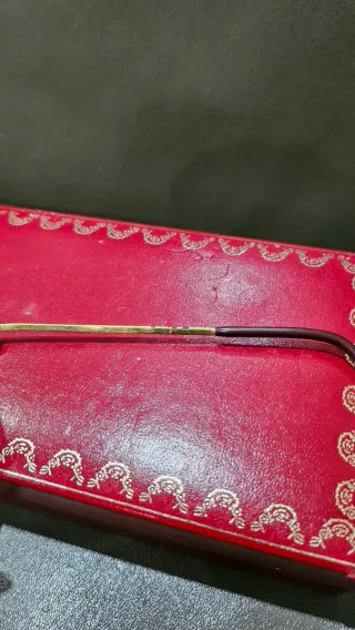 Gafas de sol Cartier doradas y grises