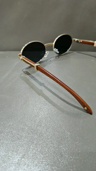 Gafas de sol ovaladas doradas y marrones