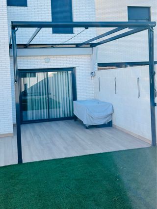 Pergola con tende da sole per patio