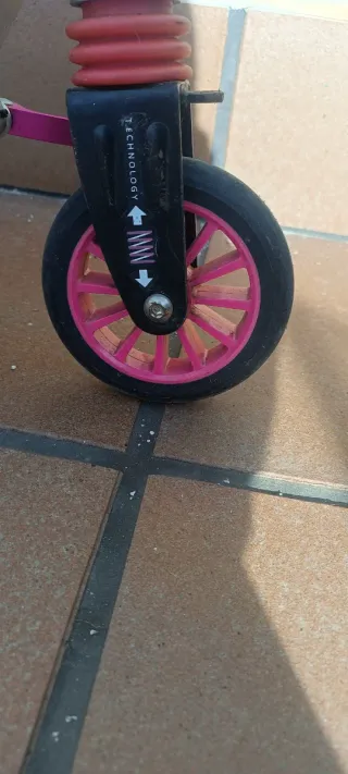 Patinete infantil negro y rosa