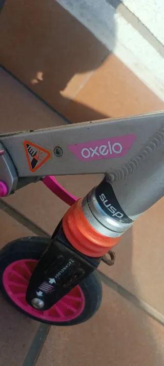 Patinete infantil negro y rosa