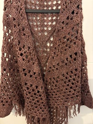 Poncho rosa con flecos sin estrenar