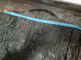 Chaqueta texturizada color negro, de MAGNA