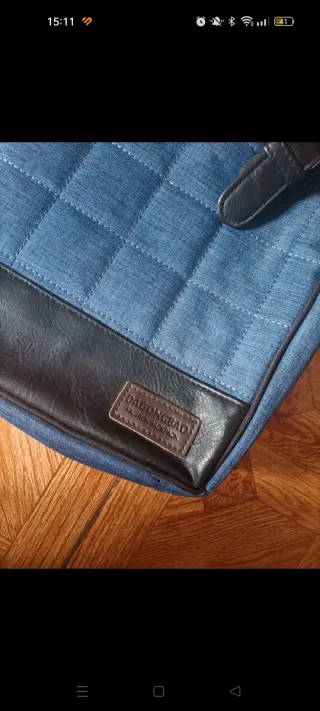 Mochila azul vaquera con bolsillo para portátil
