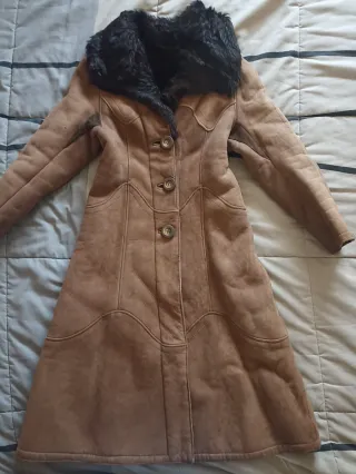 Abrigo piel vuelta mujer