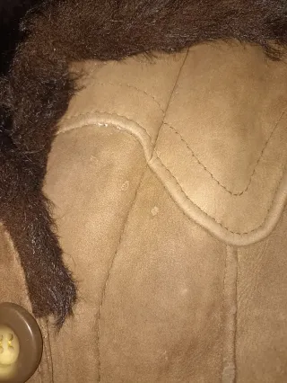 Abrigo piel vuelta mujer