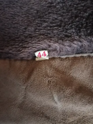 Abrigo piel vuelta mujer