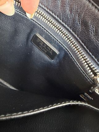 Bolso Clutch Prada chocolate y naranja