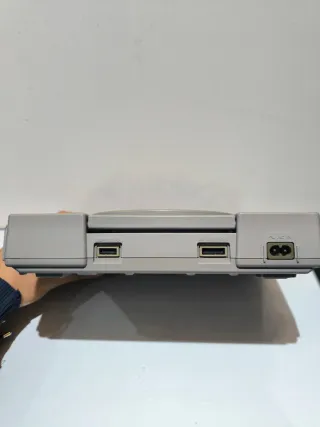 Consola PlayStation 1 con juegos
