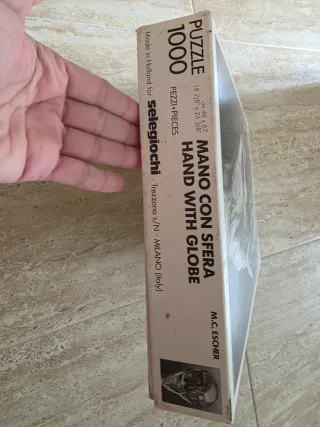 Puzzle M.C. Escher Mano y Esfera