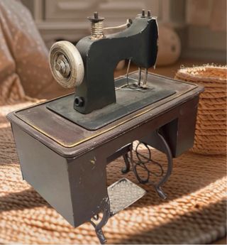 Máquina de coser vintage metal decoración