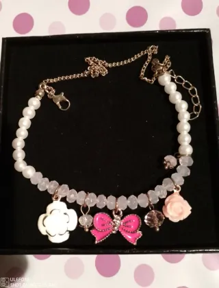 Bracciale donna perle e ciondoli