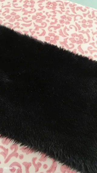 Sciarpa in pelliccia sintetica nera