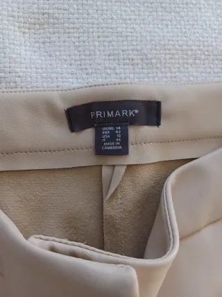 Pantalón polipiel beige pata ancha