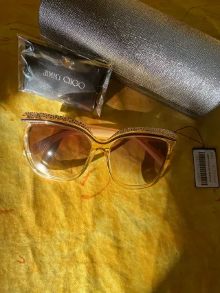 Occhiali Jimmy Choo con brillantini