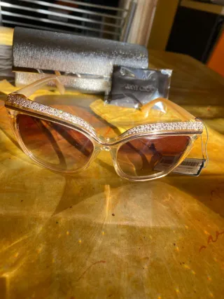 Occhiali Jimmy Choo con brillantini