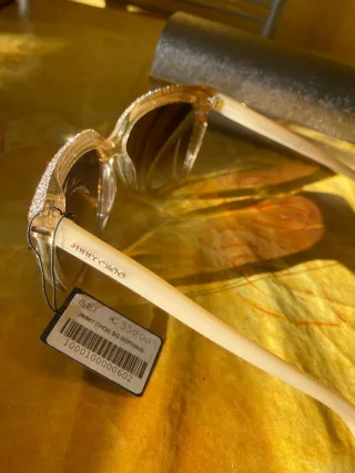 Occhiali Jimmy Choo con brillantini