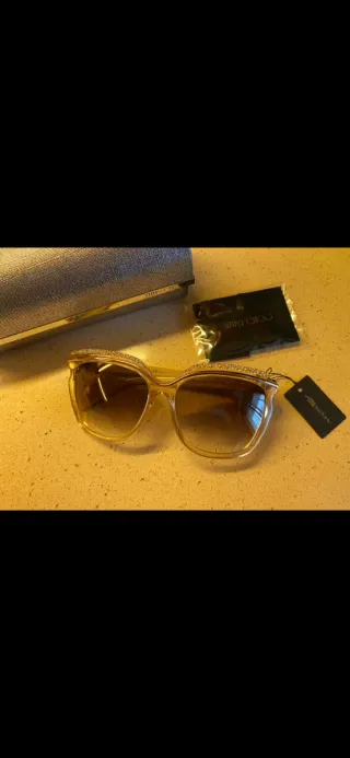 Occhiali Jimmy Choo con brillantini