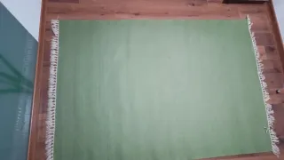 Alfombra de lana verde