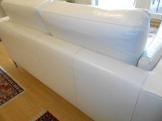 Coppia divani in pelle bianca
