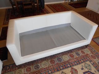 Coppia divani in pelle bianca