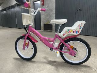 Bicicleta infantil 18 rosa con ruedines.