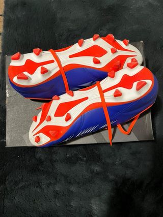 Scarpe da calcio Adidas blu e rosse