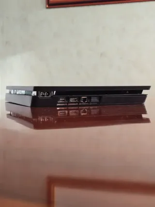 PlayStation 4 con mando dualsense PS4 y cascos