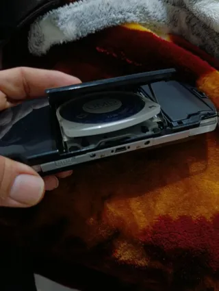 Consola PSP Negra + Cargador + 3 Juegos