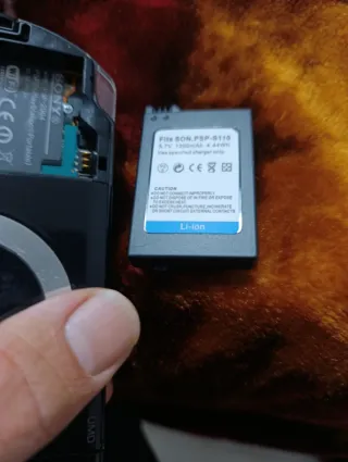 Consola PSP Negra + Cargador + 3 Juegos