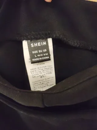 Falda pantalón negra con detalle metálico