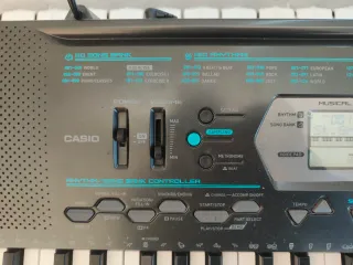 Piano Casio CTK-2100 + patas + funda