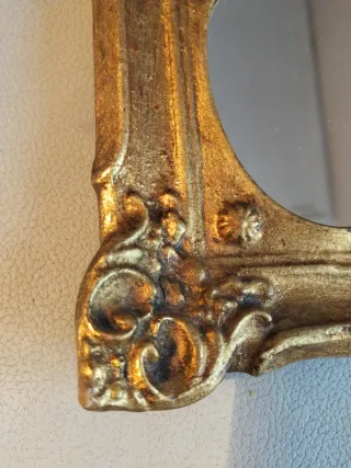 Espejo de madera dorado