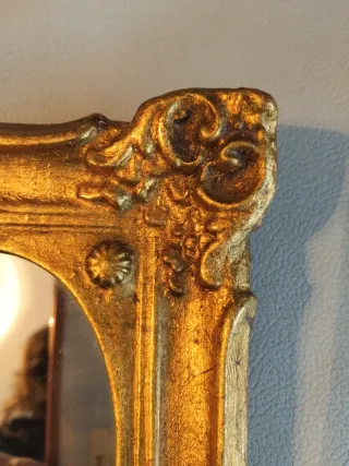Espejo de madera dorado