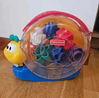 Caracol Fisher Price con bloques y música
